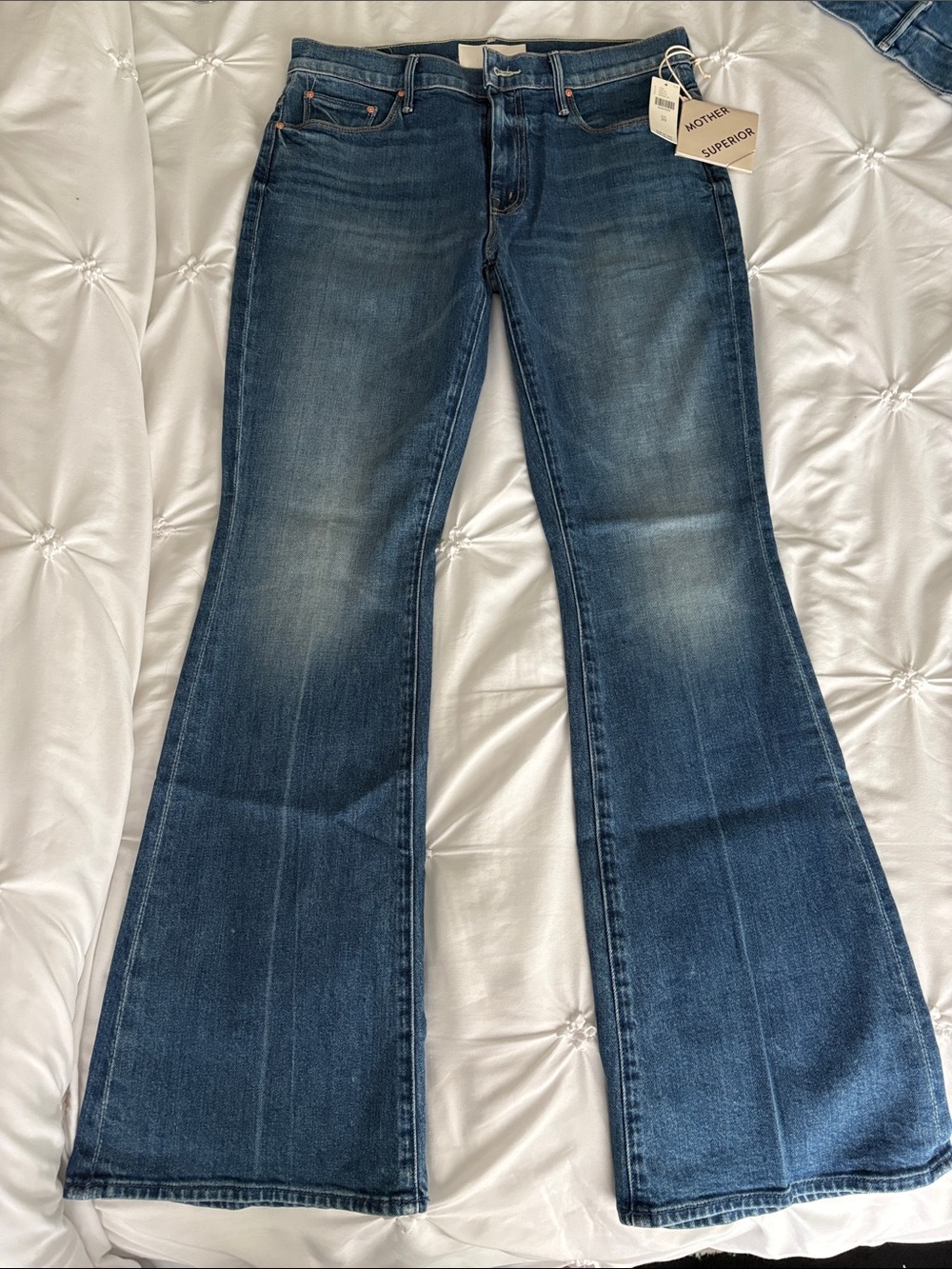 MOTHER Dark Blue Flare Jeans with Subtle Fading